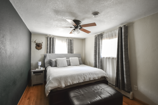 Hard wood floors in all 3 main level bedrooms.