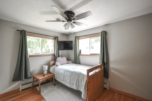 Ceiling fan, hard wood floors. Great main level bedroom.