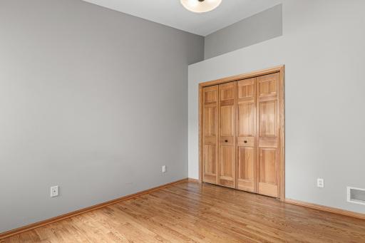 Hard-to-find second bedroom on the main level- ideal for guests, family or a home office.