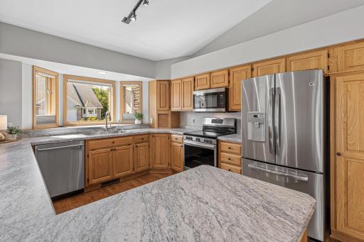 Abundant counter space and great cabinet storage is a chef's delight. The heart of the home- this kitchen will be a great place to gather.