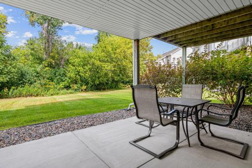 Enjoy peaceful views, mature surroundings and abundant wildlife right outside your door. The new concrete patio is great for entertaining and enjoying meals outside. Extensive landscaping done to increase privacy.
