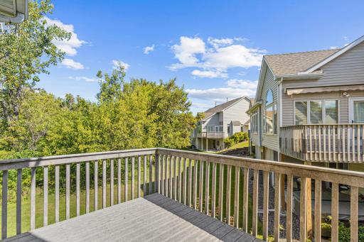 Enjoy your private maintenance free deck overlooking the big pond and mature trees. Enjoy reading the paper and drinking coffee in the morning or your favorite beverage at the end of the day.