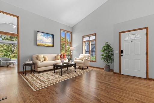 Gleaming hardwood floors, newer paint, light fixtures and Hunter Douglas window treatments throughout make this home sparkle. Walls of windows showcase the private and peaceful outdoors. Virtually staged.