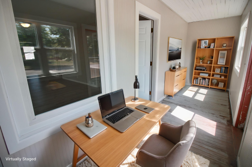 3 season porch-virtually staged as an office
