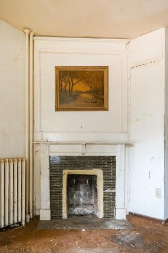 Original wood burning fireplace, Condition of chimney unknown (main level living room)