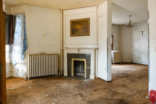 Main level living room, dining room to the far right