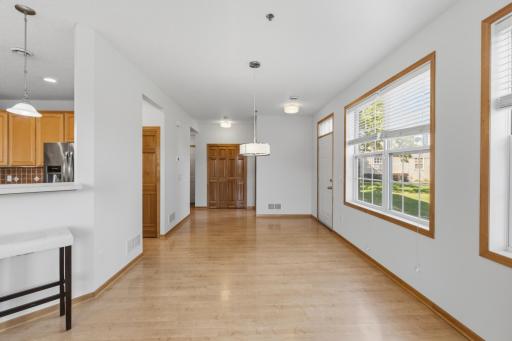 Bright and spacious open foyer and dining.