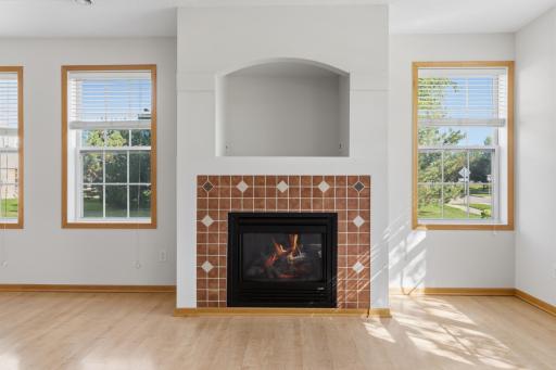 Tile front gas fireplace with cubby for your TV.
