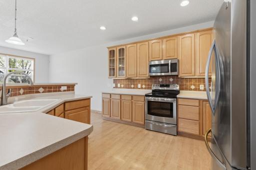 This custom quality built kitchen brings sass, class, and durability to your work space. Includes stainless steel Kenmore appliances, pantry and center island work space.