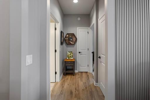 Hallway towards main bath and bedroom #2.