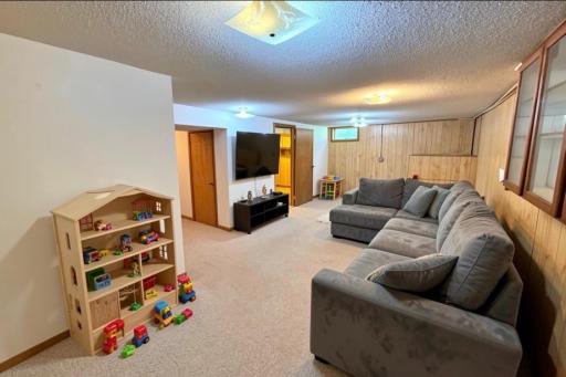 Lower level family room Virtually Staged2 .jpeg