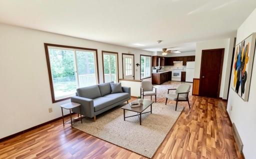 Living room and view to kitchen Virtually Staged.jpeg