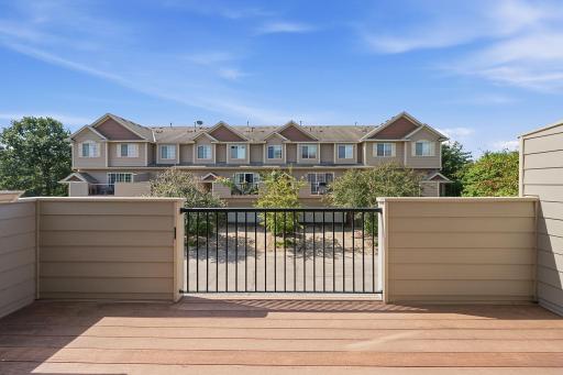Thoughtfully designed privacy walls along the deck create a more secluded outdoor setting, while direct access from the living room makes indoor-outdoor entertaining easy.