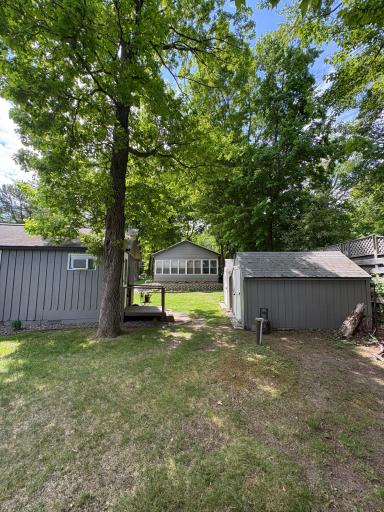 view of home 1 shed and bunkhouse from lake
