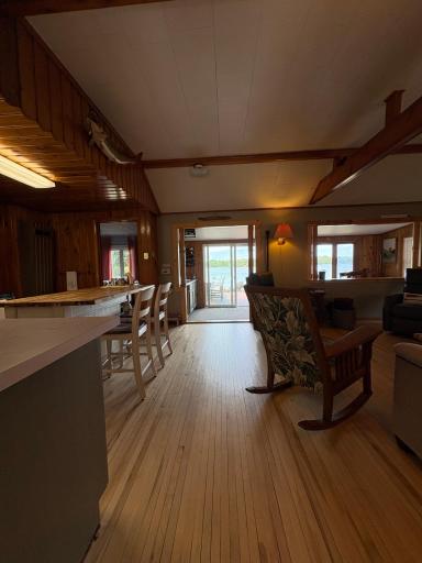 foyer into living and kitchen areas.