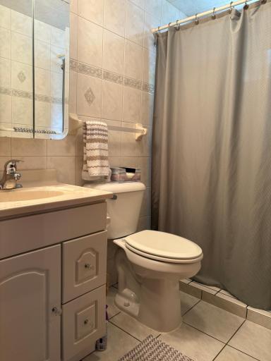 bath in home with shower curtain