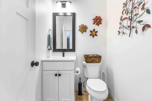 Half bath off of Rear Foyer