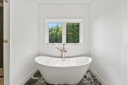 This stunning soaker tub is new and ready to be relaxed and enjoyed