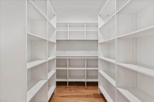 An extremely sizable butler's pantry keeps your kitchen items, food, etc. all accessible, yet hidden