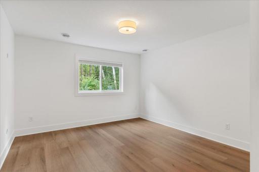 Bedroom 5, mirrors bedroom 4 in the lower level and could be anything you dream of such as an office, workout space, etc.