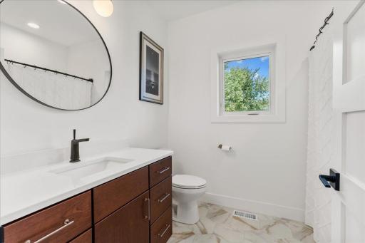Full, main floor bathroom for the two bedrooms and guests