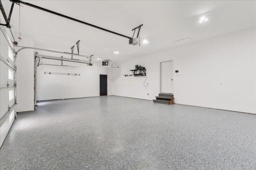 The main house garage is over-sized, heated and stunning. Who knew a garage could be stunning?! This one is!