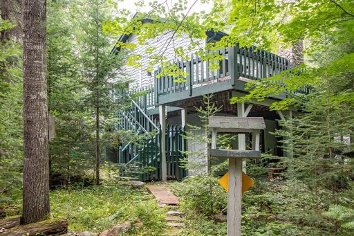 Extensive wrap around decks up & deck off lower level walkout all overlook the woods and pond. Pause and enjoy; you will not want to leave!