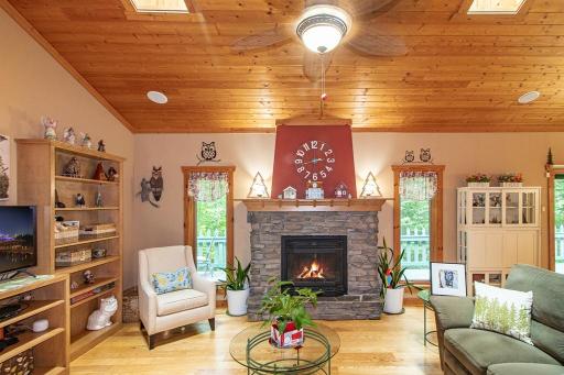 Large open Living Room features cozy gas fireplace! As seen from the entry.