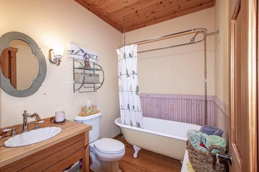 Main floor full bath features refurbished claw tub with shower!
