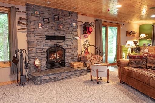 Walkout lower level features a LARGE family room (not all seen here) with woodburning fireplace and patio door to large deck!