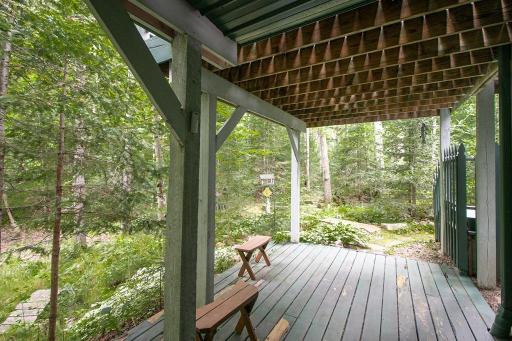 Lower deck facing towards water feature (the sound of flowing water is so relaxing) as the pump sends it towards the pond behind.