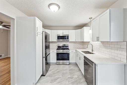 Remodeled kitchen with quartz countertops!