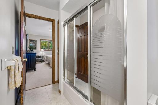 Alternate view of the private, full bath in the primary suite.