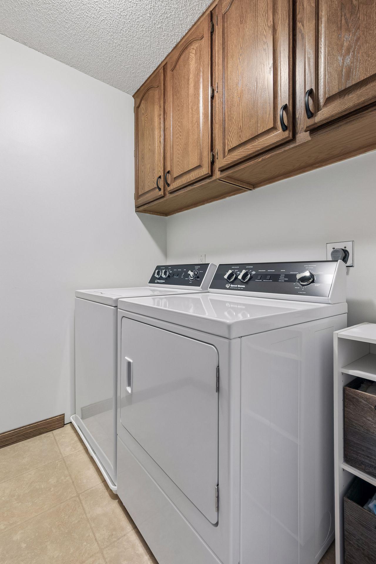 Convenient upper level laundry with newer & durable Speed Queen washer & dryer!