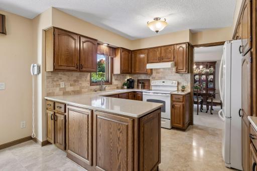 An abundance of rich walnut finished solid wood cabinets!