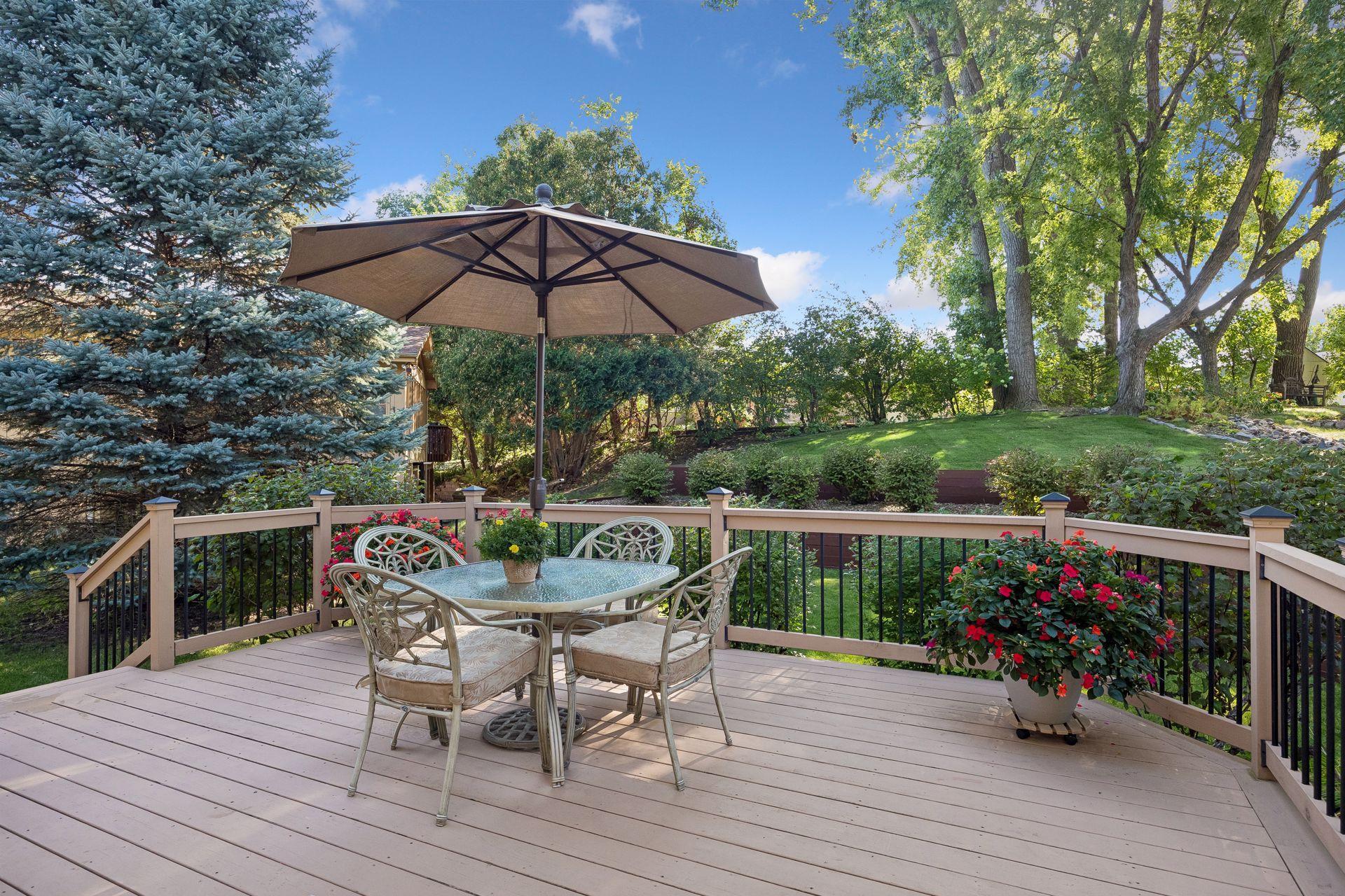 Gorgeous views from this spacious cedar deck w/ fresh paint & maintenance free aluminum balusters!