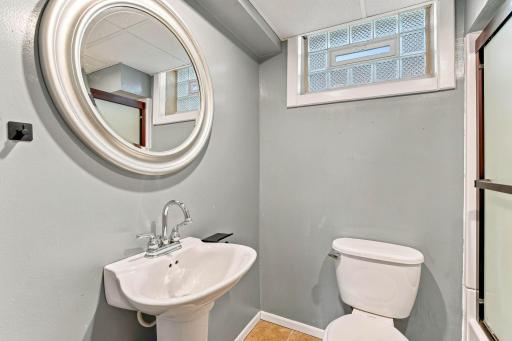 Lower level bathroom with shower.