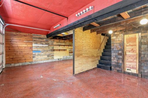 Inside garage with walk up storage area
