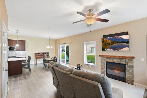 The Living Room, Dining Area and Kitchen are Seamlessly Connected in this Open Floor Plan Design