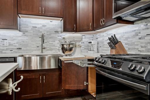 Thoughtfully Designed Kitchen Includes a Built-In Mixer Lift, Providing Convenient Countertop -Level Access and Easy Storage for a Stand Mixer