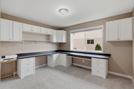 Versatile Bedroom #3. Featuring Cabinetry and Countertop Workspace- Ideal for Use as a Home Office, Hobby Room, or Additional Bedroom