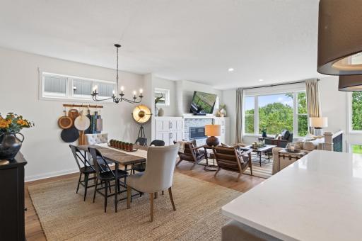 From the kitchen, the breakfast bar and dining room come into full view; an open, connected layout made for holiday entertaining, everyday family meals, and everything in between.