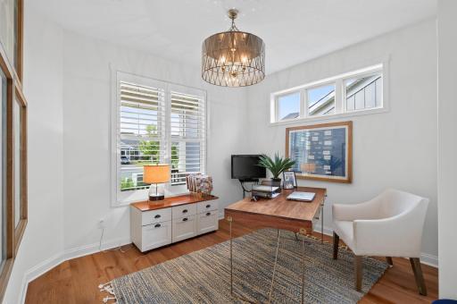 This versatile 2nd bedroom is currently used as a private home office and features custom wood hurricane shutters for privacy. Perfectly positioned on the opposite side of the home from the primary suite with a full bathroom for guest.