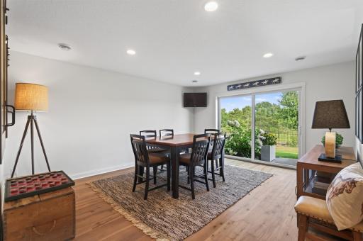 This lower level recreation room is ready for fun; plenty of space for a pool table and walkout access to the patio for fireside lounging on those beautiful fall evenings.