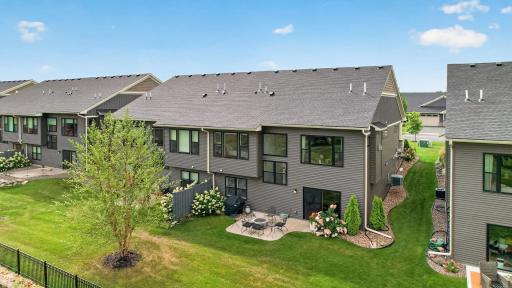 The rear view of this exceptional home says it all; carefree exterior maintenance handled by the HOA and a meticulously maintained interior that shows true pride of ownership inside and out.
