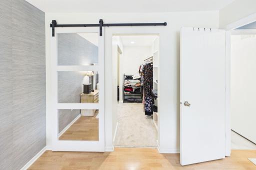 New walk-in closet: seller converted the old hall and and standard closet into the walk-in closet/dressing room.