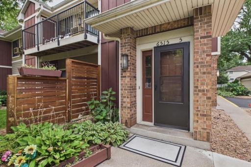 This unit is just a few steps from your garage.