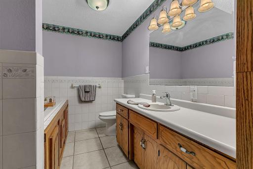 The lower level features a spacious 3/4 bathroom complete with a large soaker tub.
