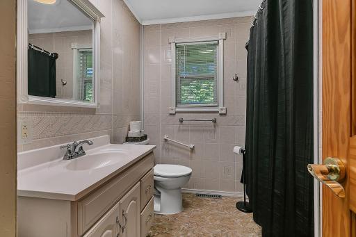 The upper level also features a convenient full bathroom.