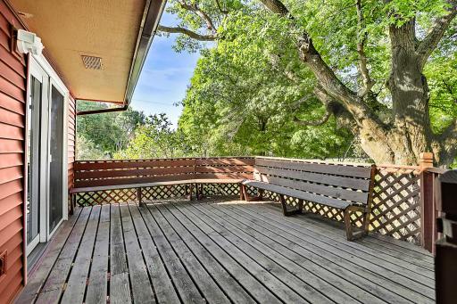 Enjoy relaxing or entertaining on the deck, complete with a wraparound built-in bench that provides plenty of comfortable seating.